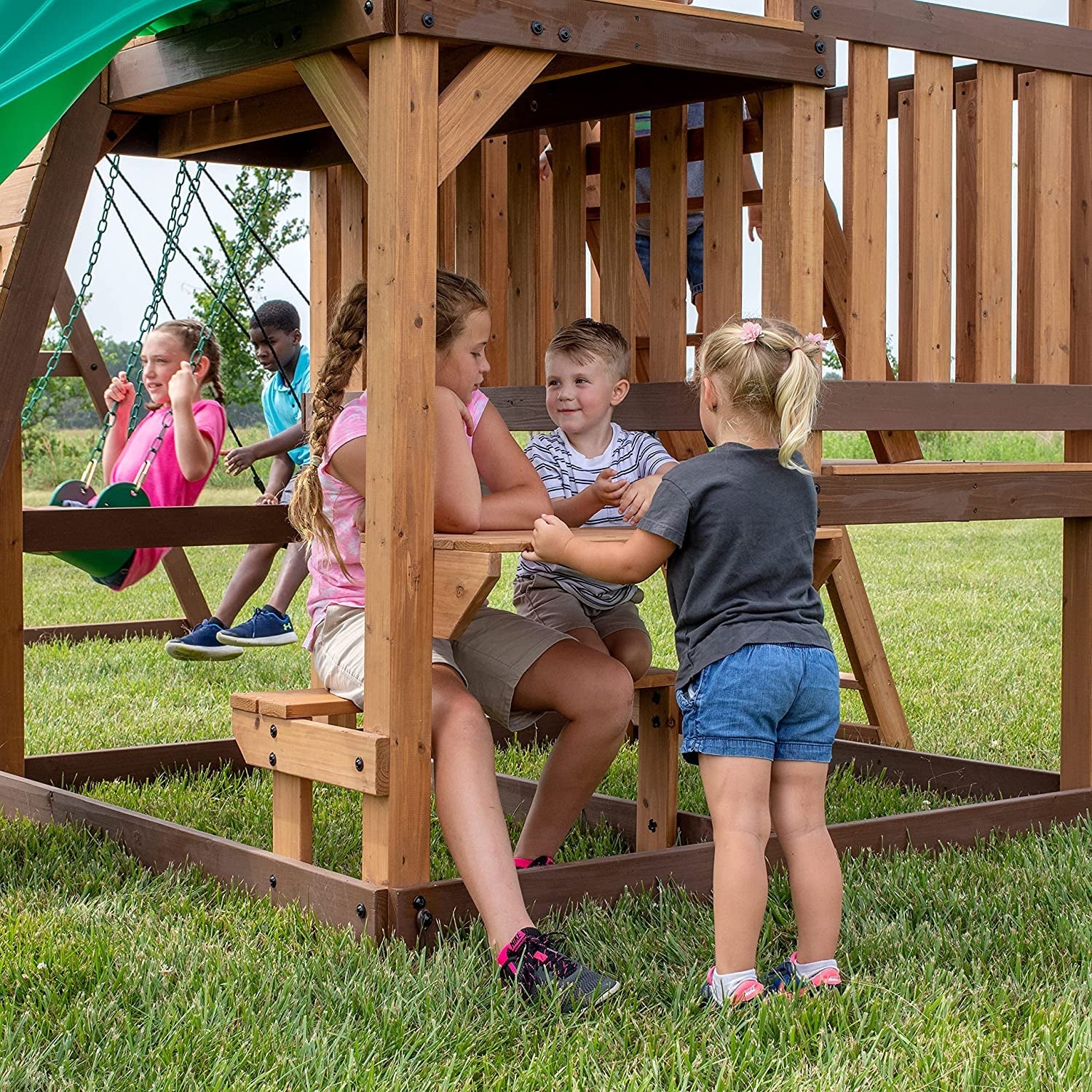 Highlander All Cedar Wooden Swing Set, 3 Levels, Step Ladder, Snack Bar with Bench, Sandbox, 2 Belt Swings, Web Swing, 10Ft Wave Slide, Rock Wall,