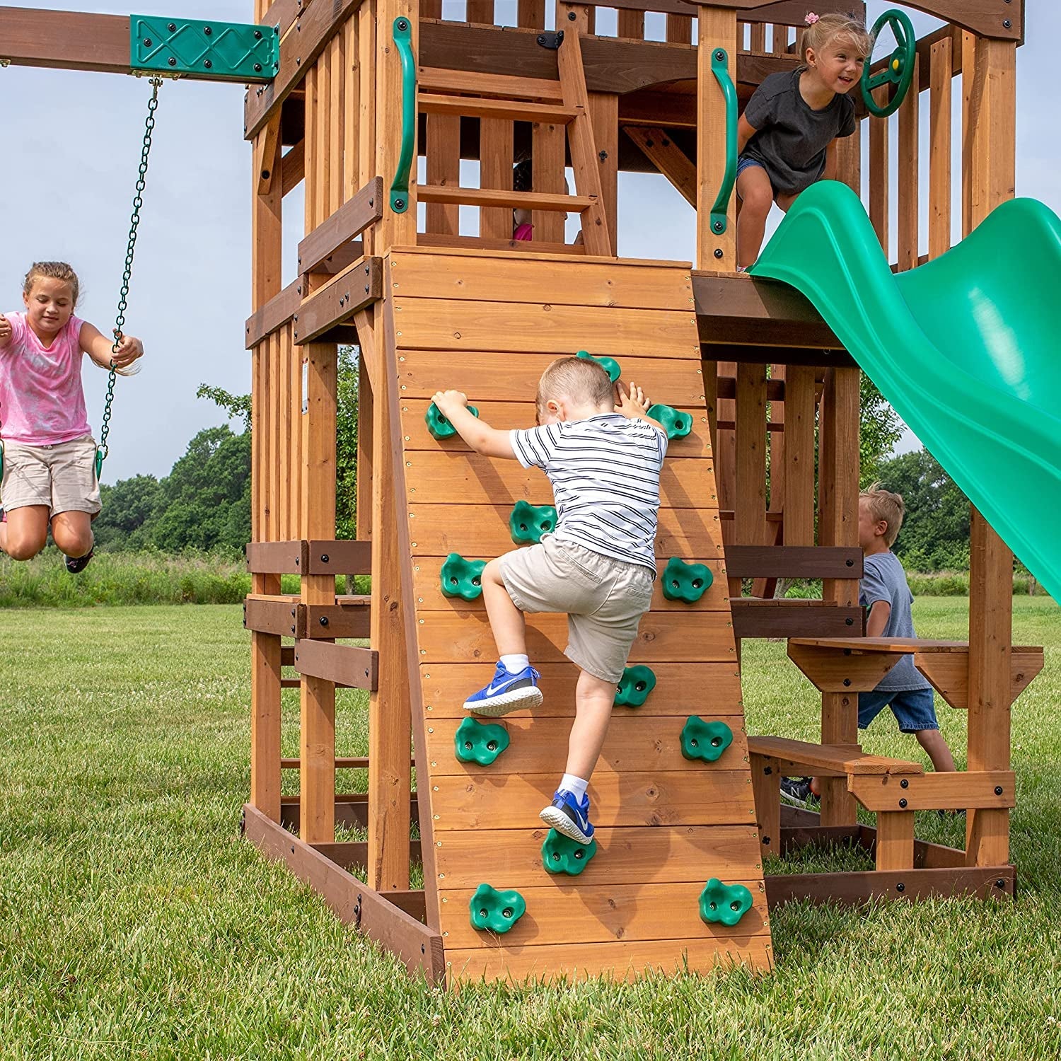 Highlander All Cedar Wooden Swing Set, 3 Levels, Step Ladder, Snack Bar with Bench, Sandbox, 2 Belt Swings, Web Swing, 10Ft Wave Slide, Rock Wall,