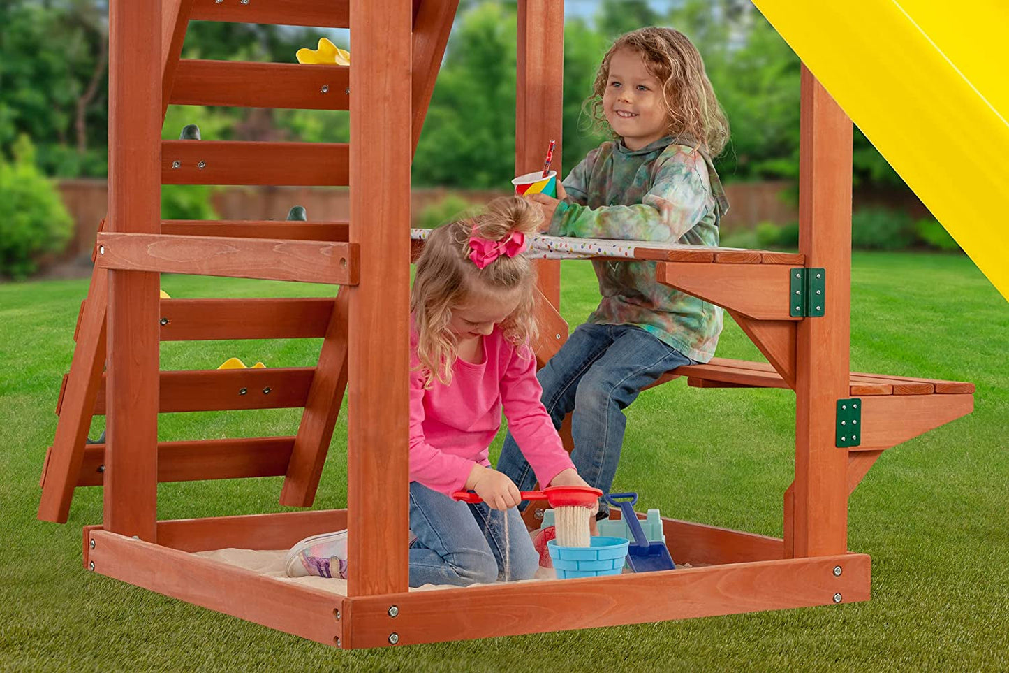 Cedar Cottage Wooden Backyard Playset | W: 163" D: 137" H: 114" | W/ 2 Belt Swings & Trapeze | Kids Age 3-10 | Sandbox, Slide & Climbing Wall | DIY Assembly | ASTM Standards | 10-Year Warranty on Wood